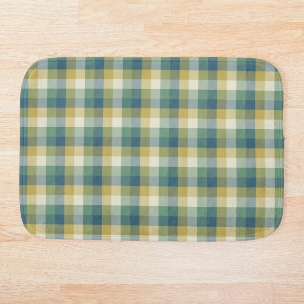 Green, blue, and yellow checkered plaid floor mat