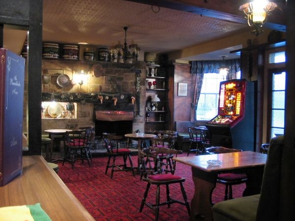 Interior of a typical English pub by Ashley Pomeroy
